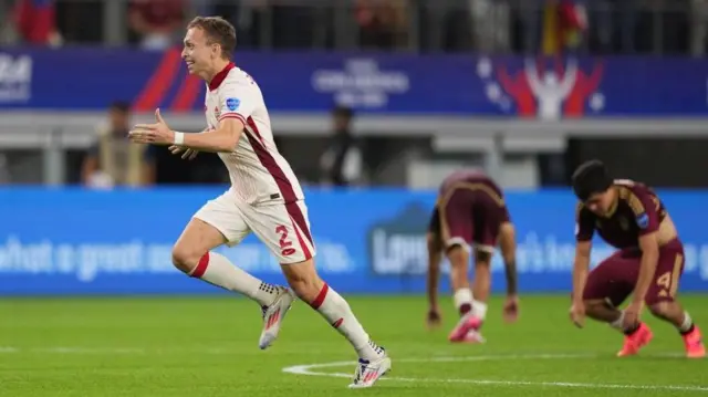 Canada's Alistair Johnston celebrates