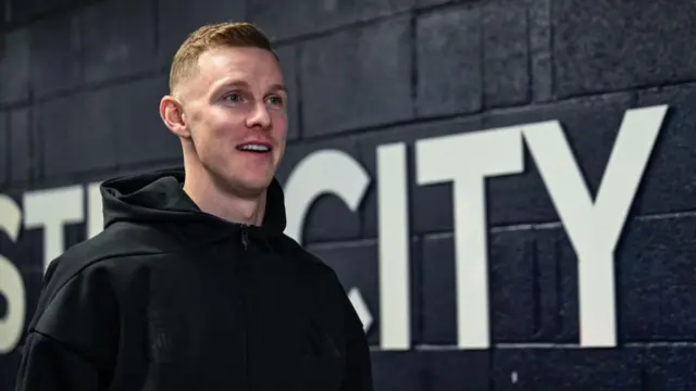 Emil Krafth smiles after arriving at stadium before match