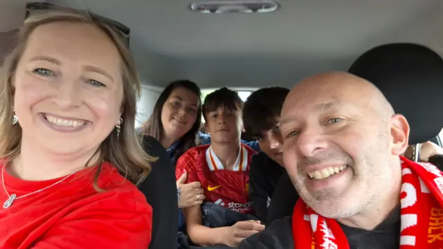 Liverpool fans on the way to the trophy parade