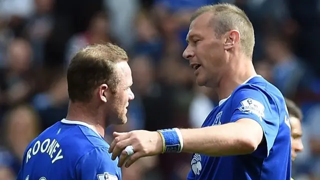 Wayne Rooney and Duncan Ferguson share a hug