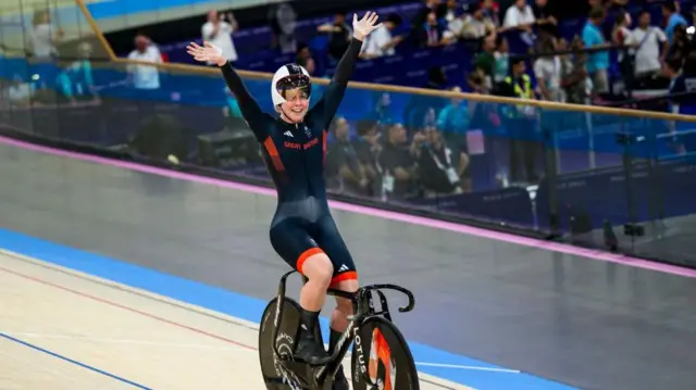 Emma Finucane celebrates at the velodrome