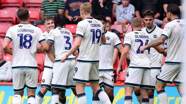 Millwall players celebrate at Sheffield United