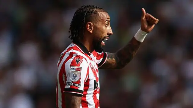 Stoke City's Sorba Thomas gives fans the thumbs up after scoring