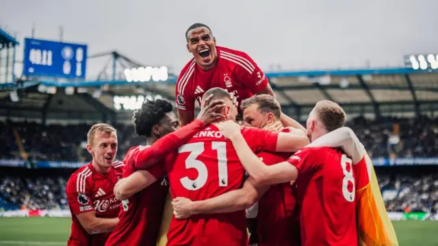 Nottingham Forest's players celebrate Chris Wood opening the scoring against Chelsea