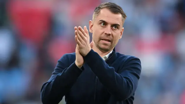 Tonda Eckert applauds the Southampton fans at Wembley Stadium