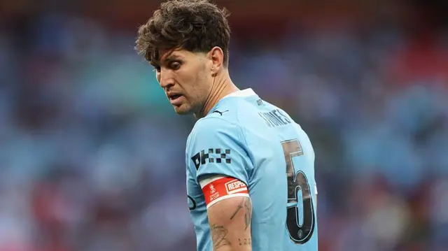 John Stones playing for Manchester City