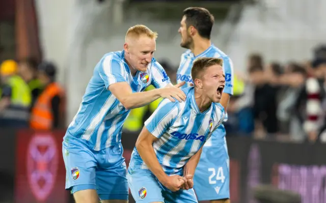 Viktoria Plzen's Lukas Cerv (R) celebrates scoring to make it 1-0 Vaclav Jemelka with teammate during a UEFA Europa League playoff second leg match between Heart of Midlothian and Viktoria Plzen at Tynecastle Park