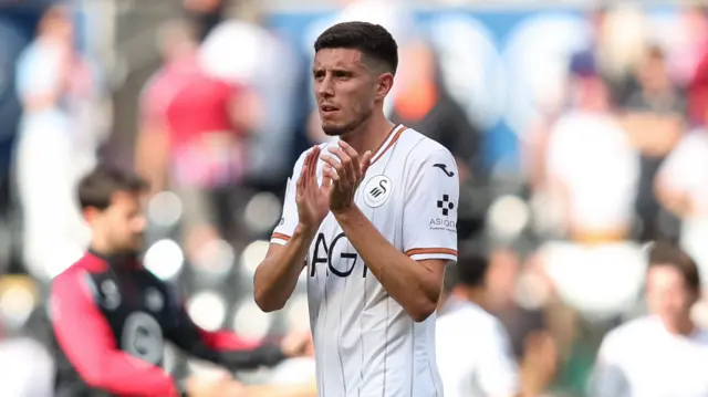 Ross Stewart applauds after Swansea's draw with Sheffield United