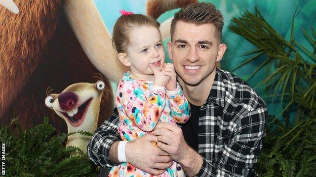 Max Whitlock with his daughter Willow