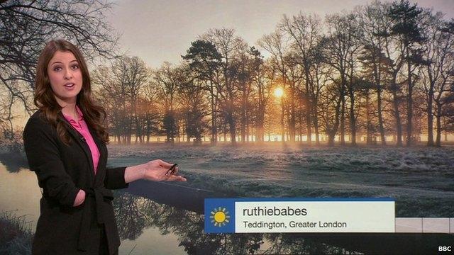 BBC Weather presenter Lucy Martin in front of a photo of a frosty sunrise