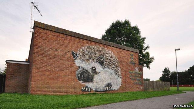 Giant hedgehog mural on wall. Artist Louis Masai, SAW and Somerset Wildlife Trust - Routes to the River Tone.