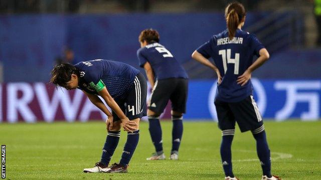 Japan players react