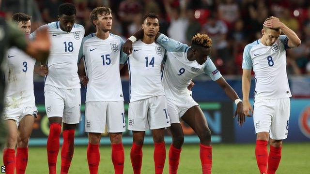 England's players react after losing to Germany in the semi-final of the European Under-21 Championship