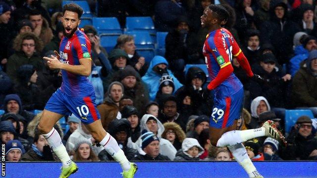 Andros Townsend celebrates scoring against Manchester City