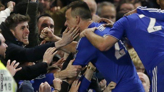 Chelsea captain John Terry was mobbed by fans after scoring his controversial 98th minute equaliser