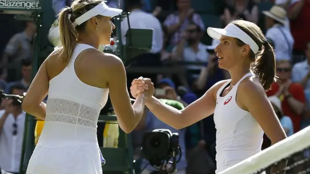 Johanna Konta shakes hands with Maria Sharapova