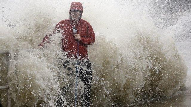 TV reporter caught in storm