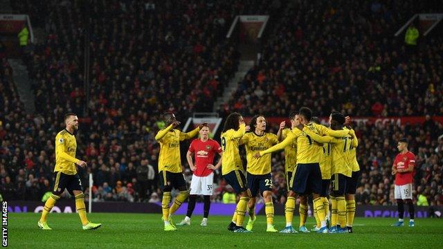 Arsenal players celebrate