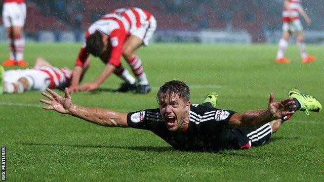 Jamie Ward celebrates scoring for Nottingham Forest against Doncaster in the League Cup