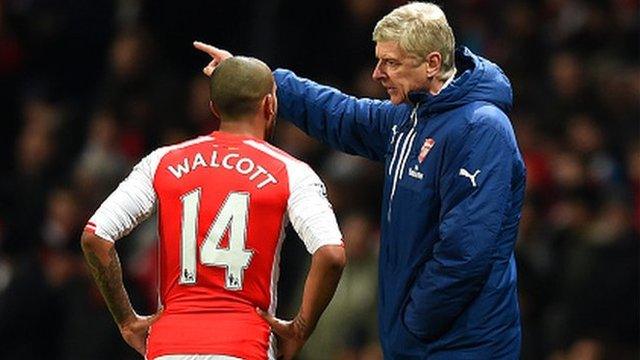 Arsenal forward Theo Walcott (left) and manager Arsene Wenger