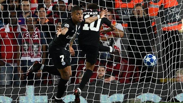 Kylian Mbappe celebrates scoring for Paris St-Germain against Liverpool