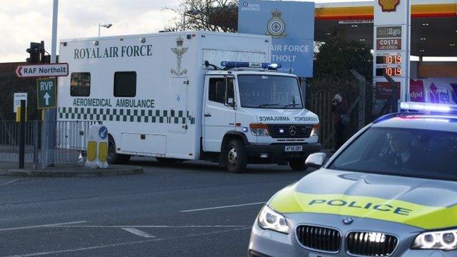 Nurse Pauline Cafferkey is driven an away in ambulance after landing at Northolt just west of London, February 23, 2016