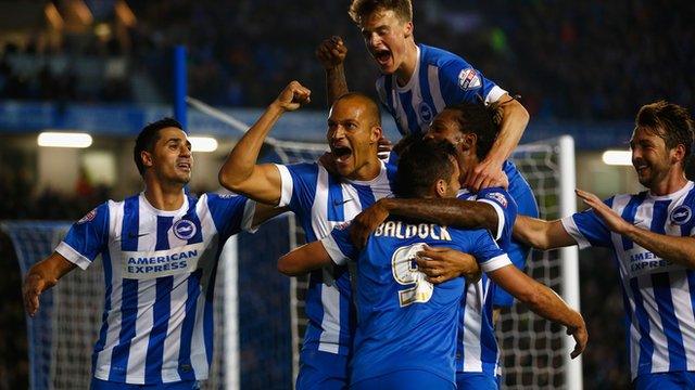 Brighton players celebrate a goal