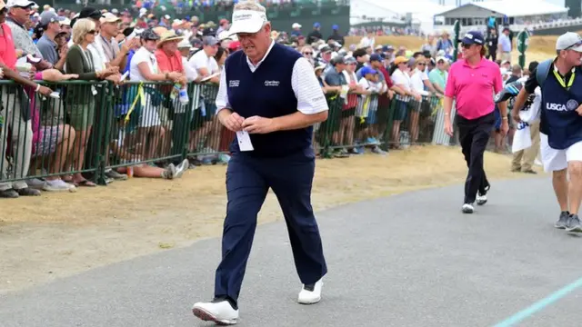 Colin Montgomerie walks towards the scoring area