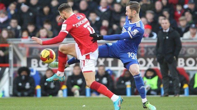 Philip Zinckernagel and James Maddison battle for the ball