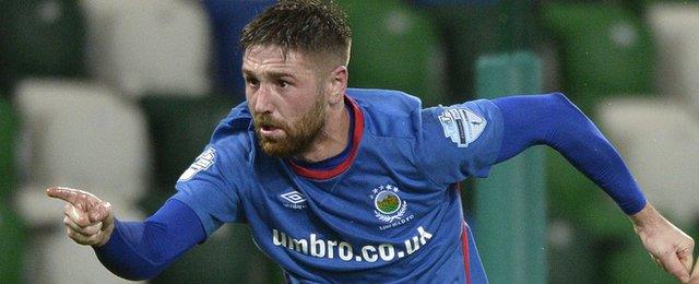 Linfield defender Mark Stafford cancelled out his own goal with a glancing header at Windsor Park