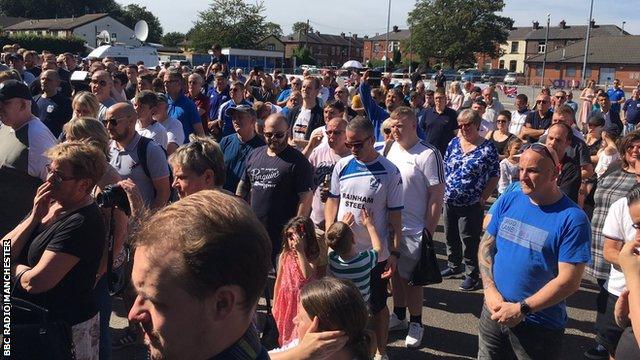 Hundreds of Bury fans arrived at Gigg Lane to show their support on Saturday