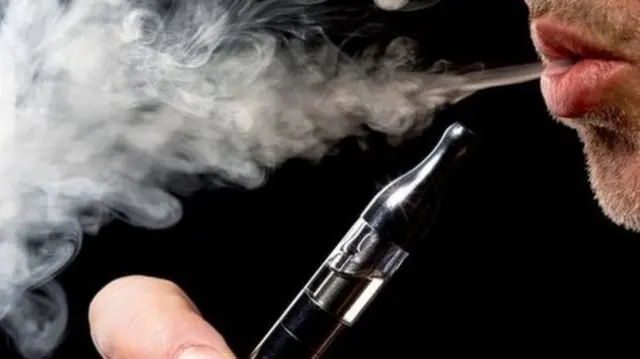 Man using an e-cigarette