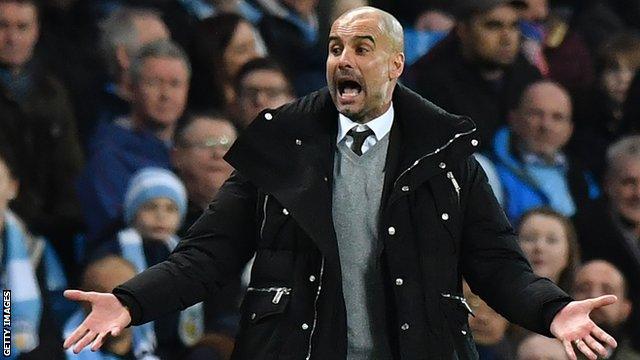 Man City boss Pep Guardiola issues instructions to his players