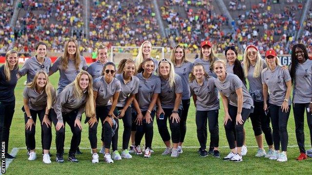 Vicky and the team paraded the pitch at half-time in the men's game against Borussia Dortmund