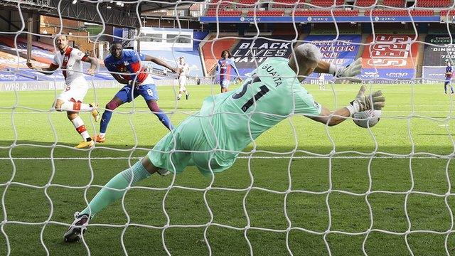 Crystal Palace keeper Vicente Guaita makes a save during his side's game with Southampton