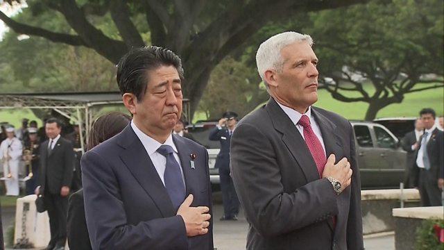 Japanese PM Shinzo Abe and director of the National Memorial of the Pacific, James Horton.