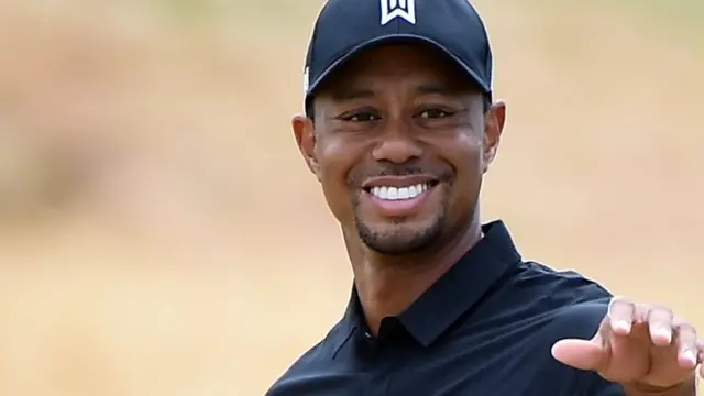 Tiger Woods smiles