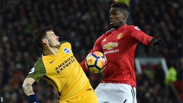 Pascal Gross in action against Paul Pogba