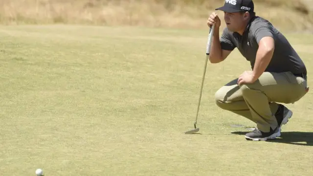 Daniel Summerhays lines up a putt