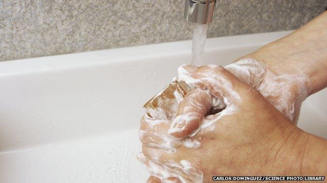 Washing hands at a sink