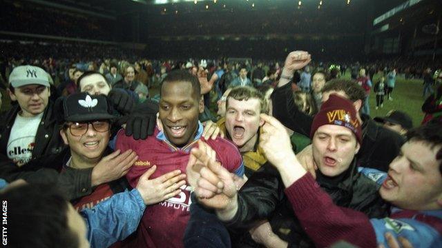 Ehiogu celebrates with Aston Villa fans