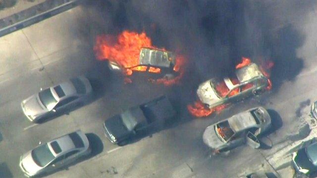 Cars on fire on road