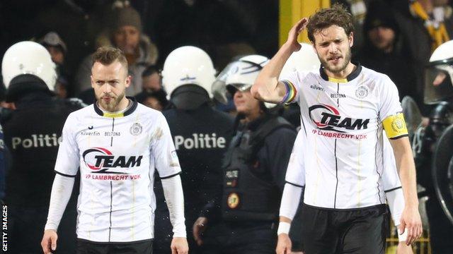 Killian Overmeire (right) looks dejected during a game between Lokeren and K Beerschot in February