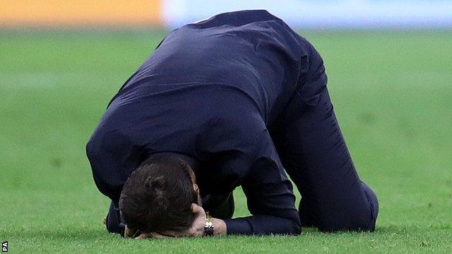 Tottenham boss Mauricio Pochettino sinks to his knees after Tottenham seal a place in the Champions League final