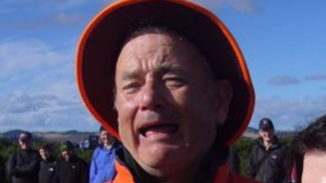 Facebook post of a baby crying with Bill Murray scrunching up his face similarly behind