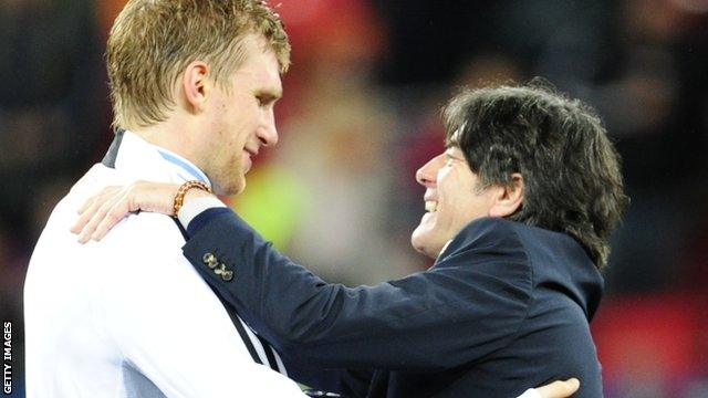 Per Mertesacker and Joachim Low