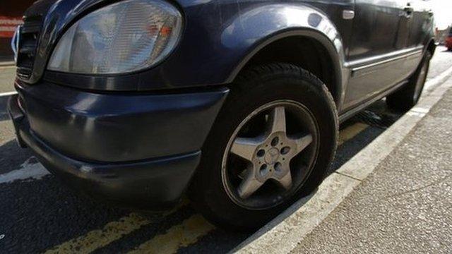 Car on double yellow lines