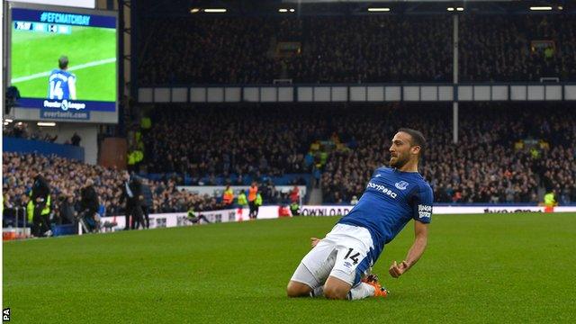 Cenk Tosun celebrates scoring for Everton against Brighton