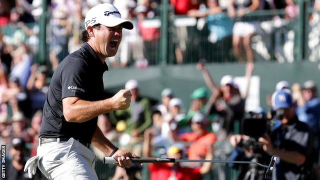 Brain Harman celebrates on the 18th green