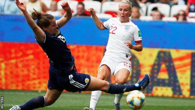 Scotland's Sophie Howard tackles England's Beth Mead